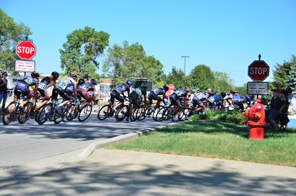 Cyclists racing around corner on to Tonne Road