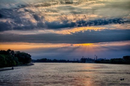 Sunlight through clouds over the Rock RIver