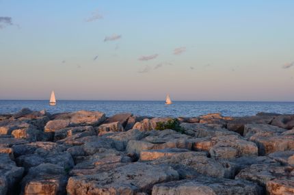 Colorful view of Lake Michigan shoreline and sail boats