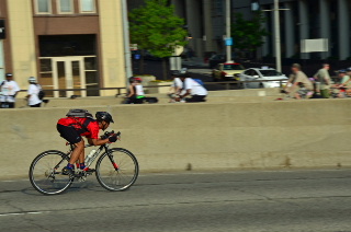 Racer cycling down Lake Shore Drive