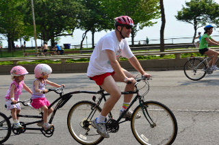 Twins on a double trailer bike